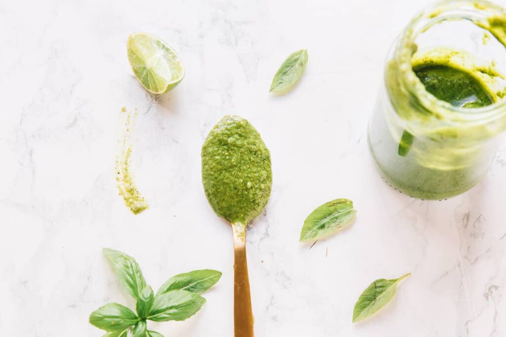 Esy Veagn Basil Pesto in spoon to show texture 