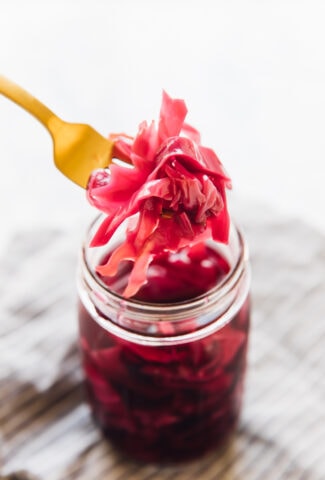 Quick Pickled Cabbage on Fork over Jar